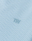 Icon Polo Light Blue Logo